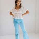 Front view of East Coast Flare jeans in blue corduroy with flare leg. 