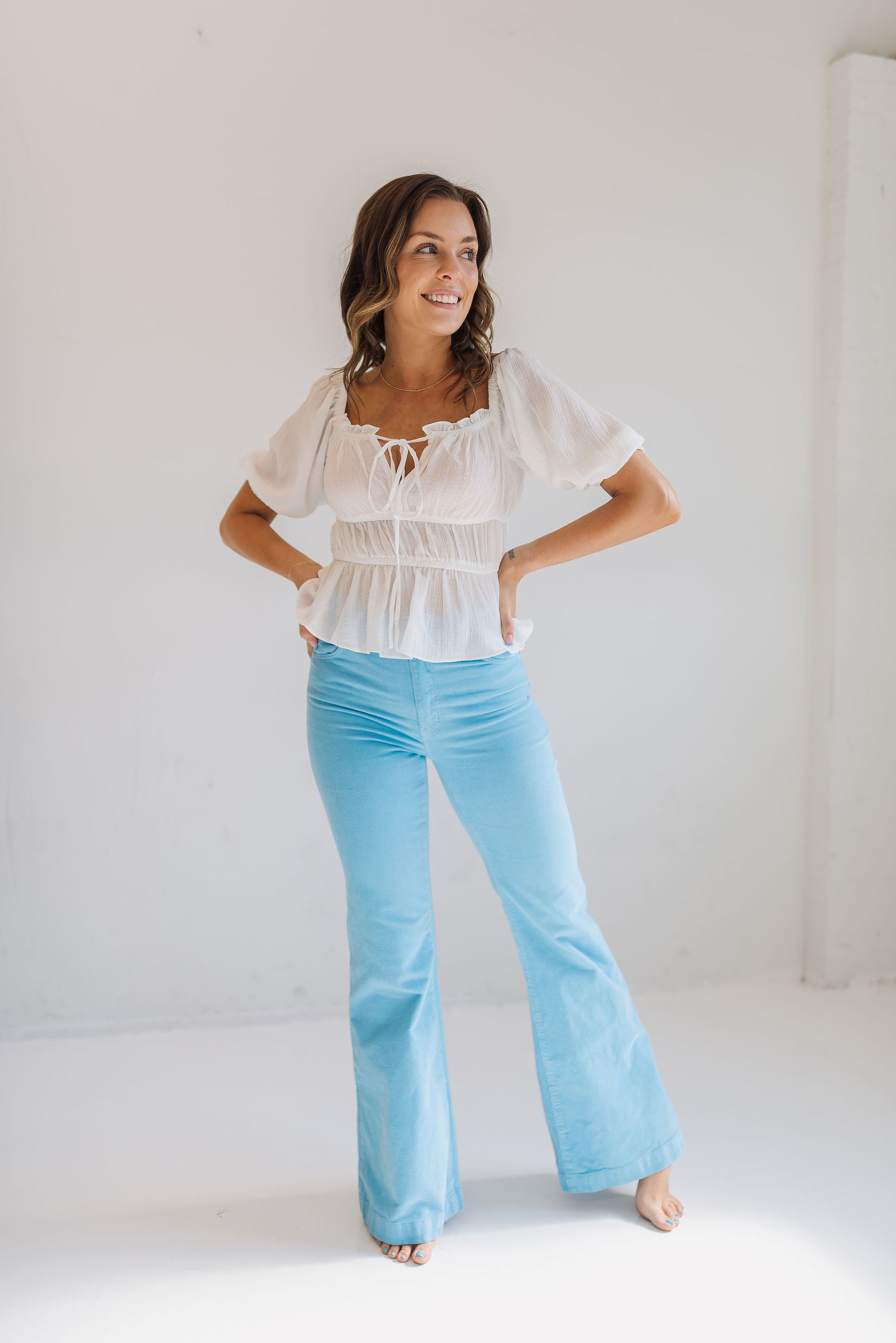 Front view of East Coast Flare jeans in blue corduroy with flare leg. 