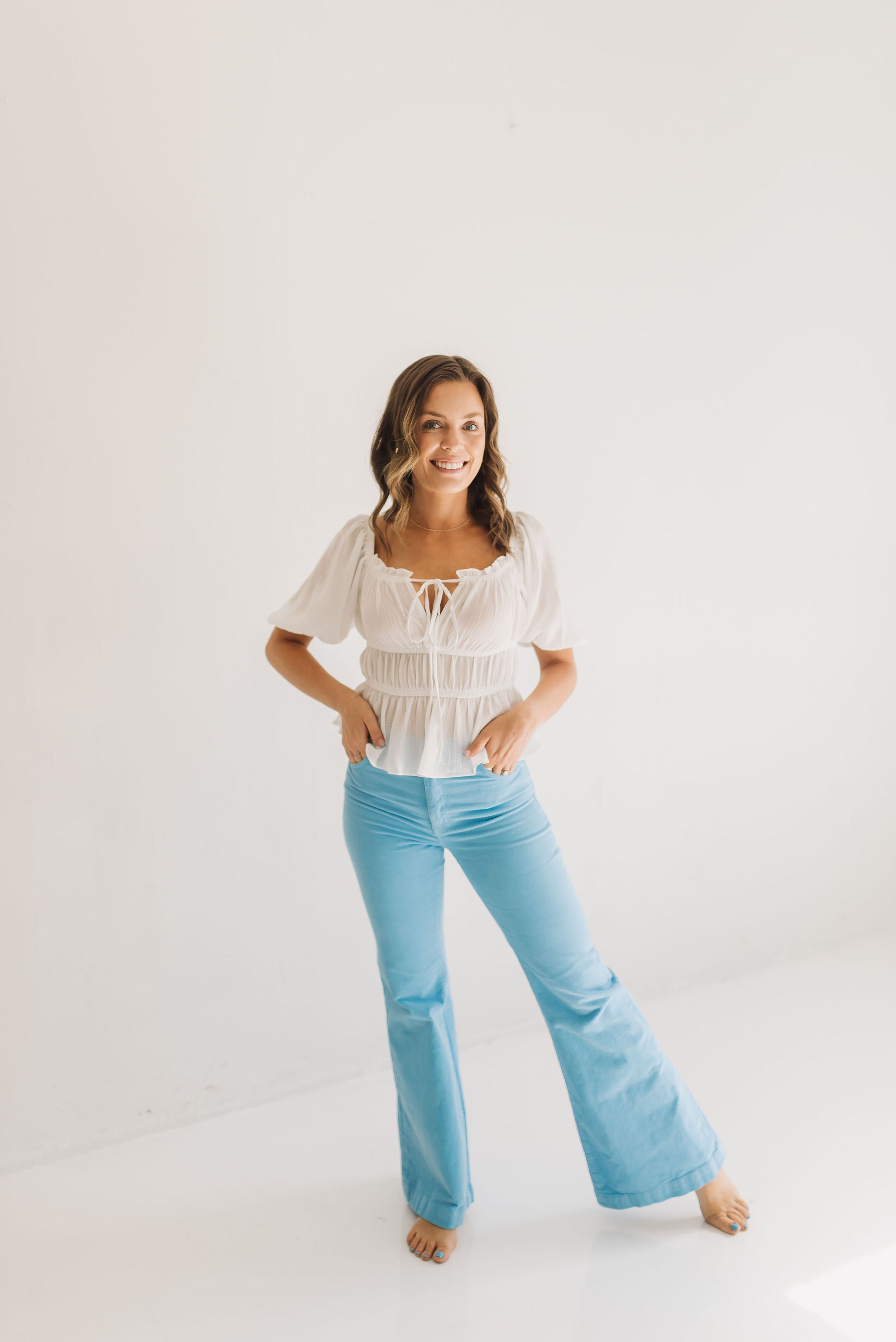 Front view of East Coast Flare jeans in blue corduroy with flare leg. 