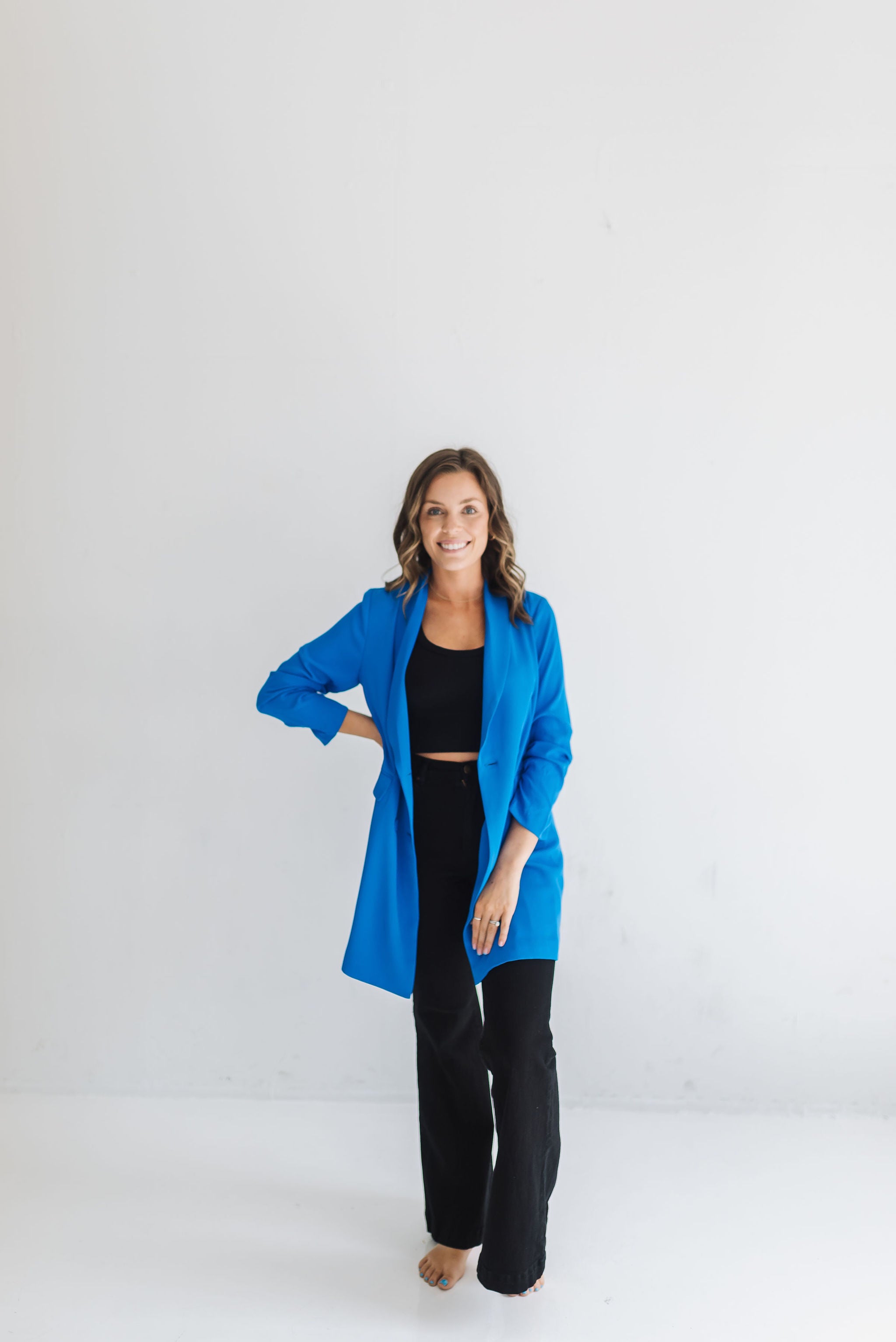 Front view of oversized Sierra Blazer with button closure and 3/4-length scrunched sleeves. 