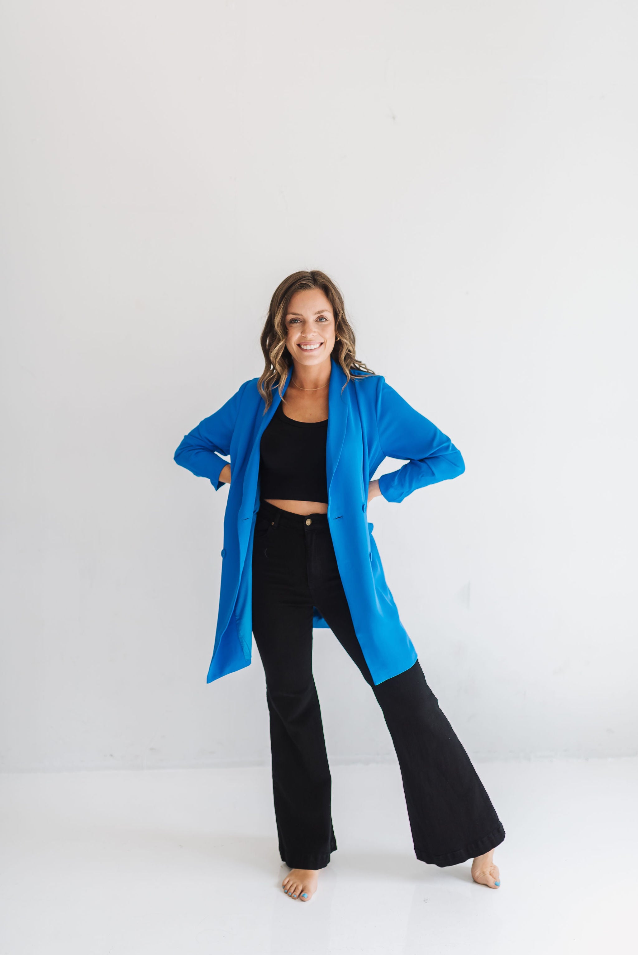 Front view of oversized Sierra Blazer with button closure and 3/4-length scrunched sleeves. 