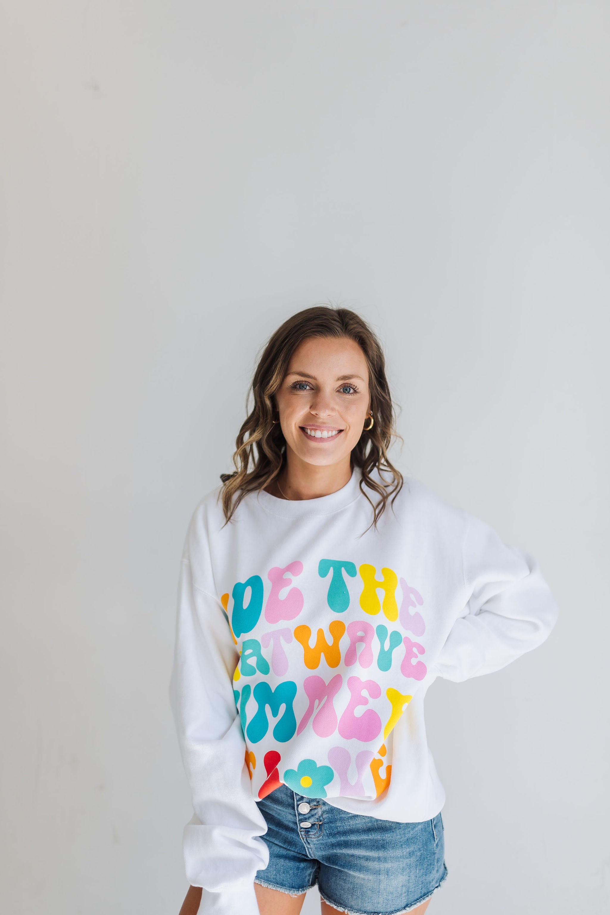 Front view of oversized crew cut Stanley Sweatshirt with neon graphic. 