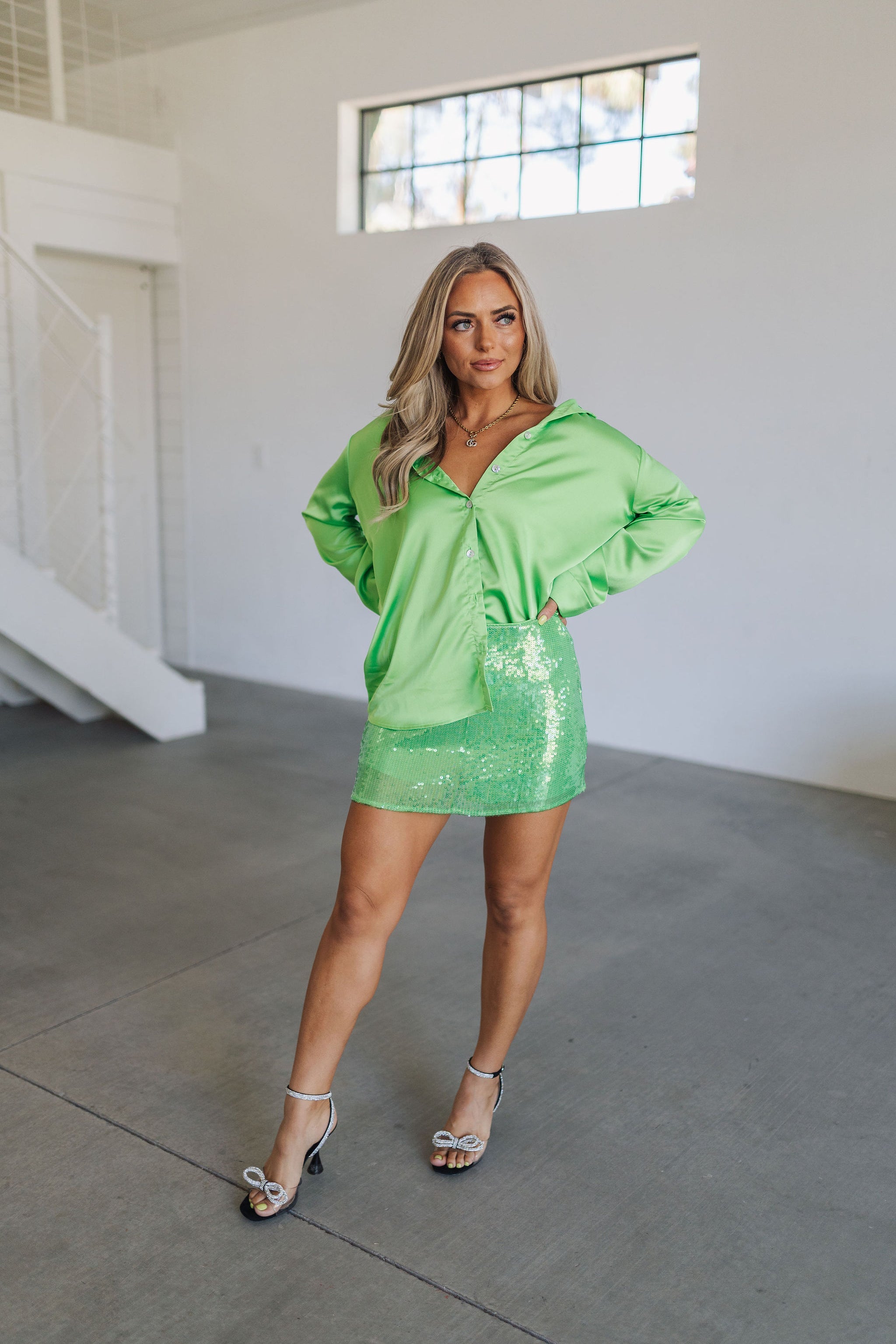 Front view of Smith Button Down in bright green luxe satin with button up front and collar neckline. 