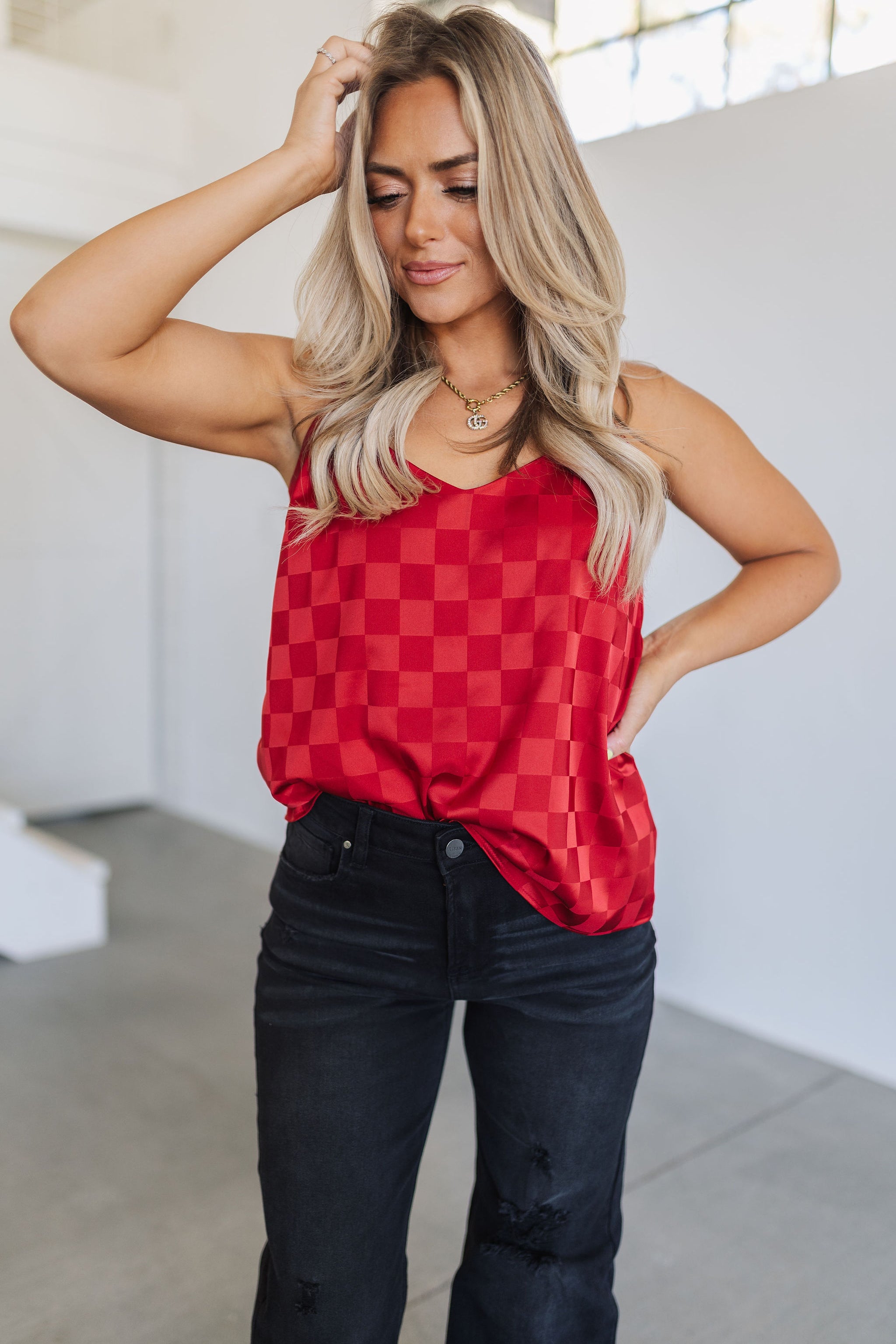 Front view of Spotlight Tank with spaghetti straps and allover red checkered satin print. 