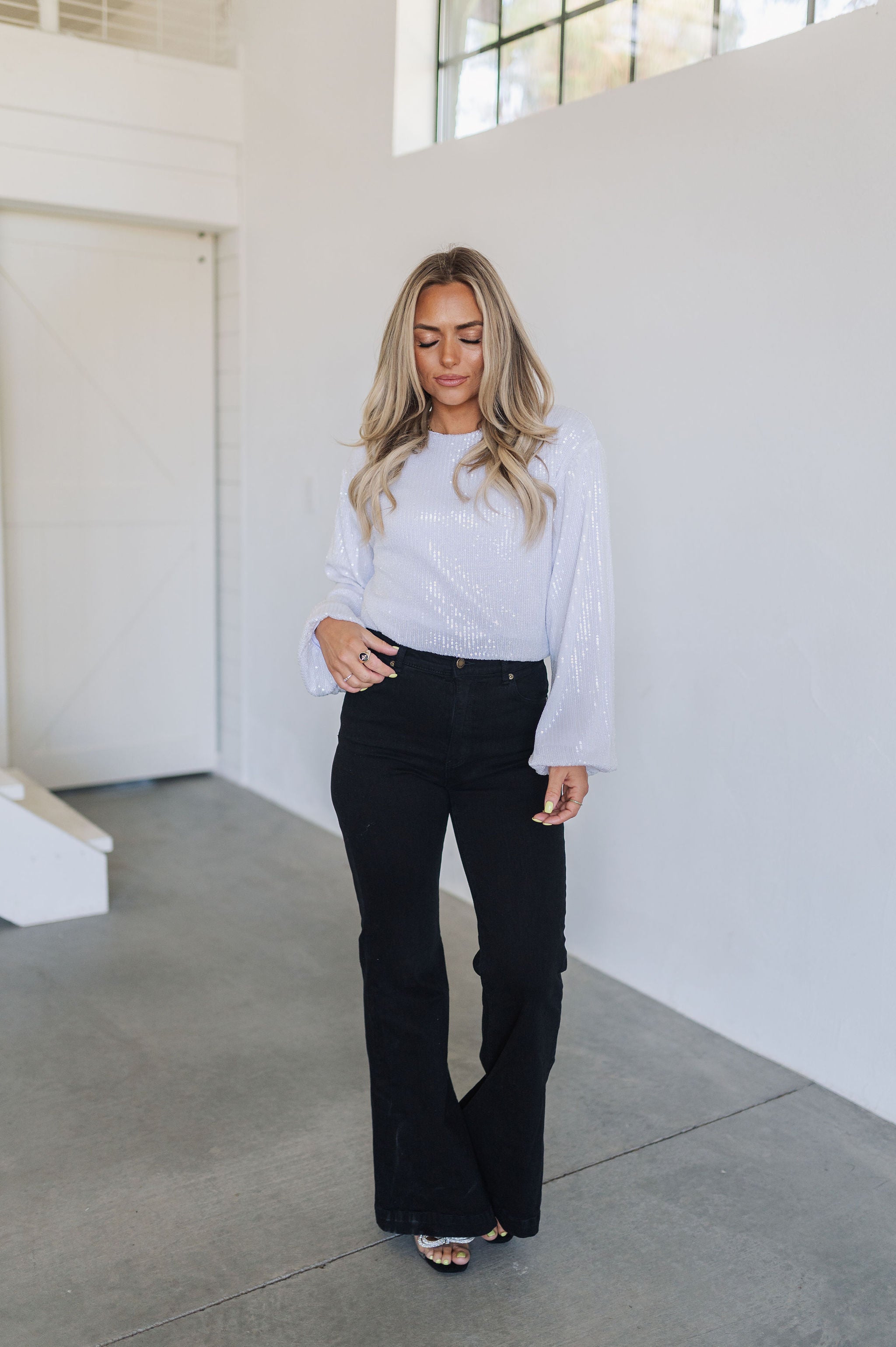 Front view of East Coast Flare jeans in black corduroy with flare leg.