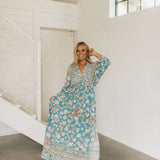 Front view of Ocean Drive Maxi Dress with dolman sleeves, tie-front waist, and V neck. 