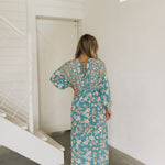 Rear view of Ocean Drive Maxi Dress with dolman sleeves and tie-back waist.