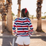 Rear view of white linen Hendrix Shorts.