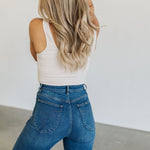 Rear view of Sailor Jeans in blue denim with angled rear pockets.