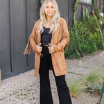 Front view of Dutton Fringe Suede Jacket in cocoa with fringe detailing at chest and arms. 