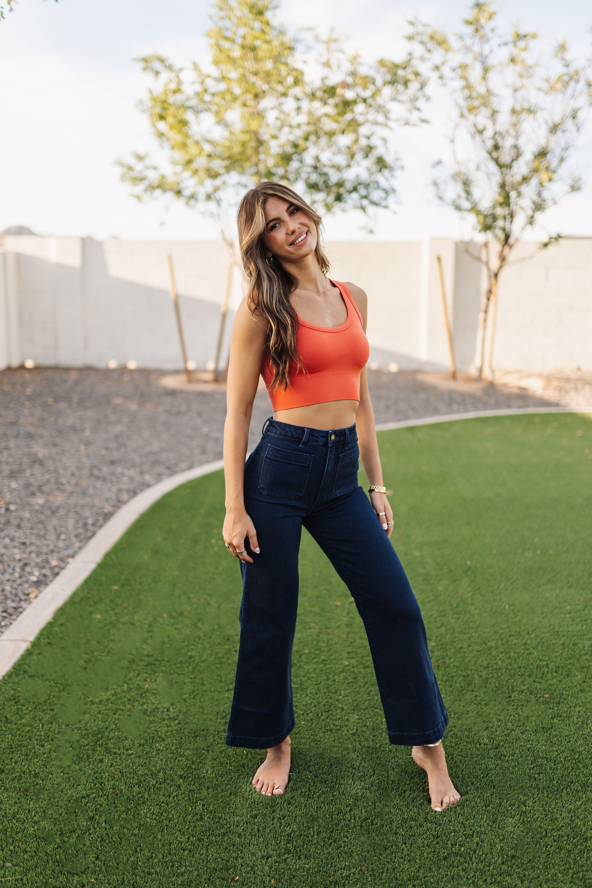 Front view of Sailor Jean in dark indigo color with wide leg and front patch pockets. 