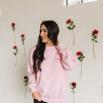 Front view of The Stanley Sweatshirt crewneck with heart graphic detail.