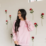 Front view of The Stanley Sweatshirt crewneck with heart graphic detail.