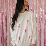 Front view of crewneck Pink Bolts Graphic Sweatshirt with corduroy detail. 
