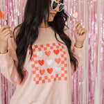 Front view of Candy Hearts Sweatshirt with heart and checkered design. 