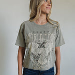 Front view of World Tour Graphic Tee with mineral wash, distressed graphic, and raw hem. 