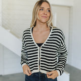 Front view of  Beverly Crochet Knitted Cardigan with button front and black and white stripes. 