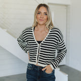 Front view of  Beverly Crochet Knitted Cardigan with button front and black and white stripes. 