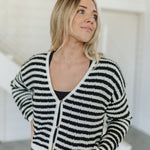 Front view of  Beverly Crochet Knitted Cardigan with button front and black and white stripes. 