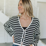 Front view of  Beverly Crochet Knitted Cardigan with button front and black and white stripes. 