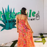 Side view of Long Weekend Maxi Dress with allover neon print and slim shoulder straps. 