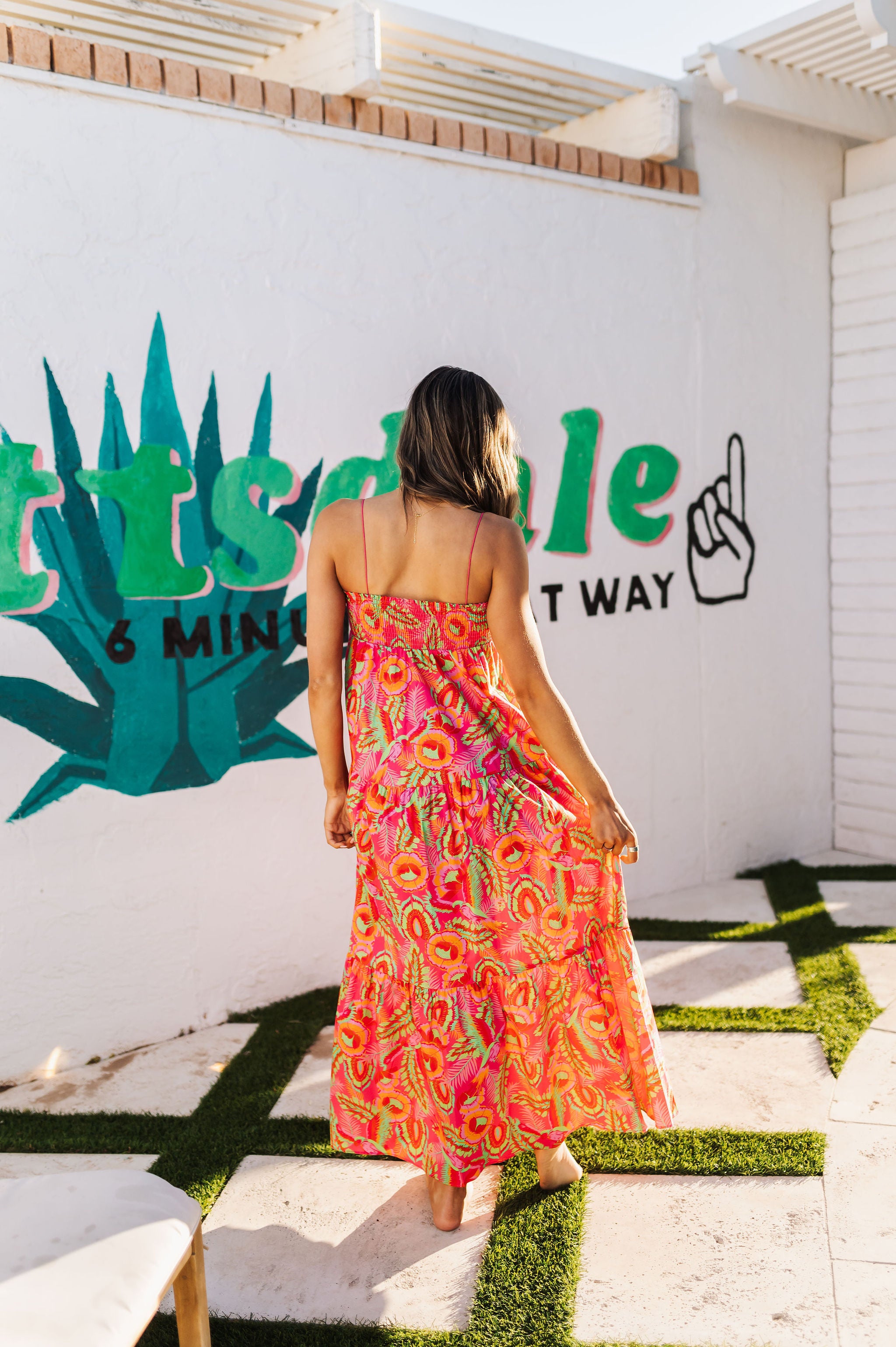 Side view of Long Weekend Maxi Dress with allover neon print and slim shoulder straps. 