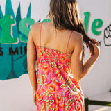 Close up rear view of Long Weekend Maxi Dress with allover neon print and slim shoulder straps. 