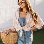 Front view of tied Kennedy Striped Button Down Long Sleeve Shirt with fringe hemline.