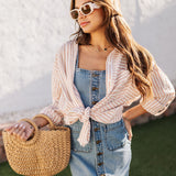 Front view of tied Kennedy Striped Button Down Long Sleeve Shirt with fringe hemline.
