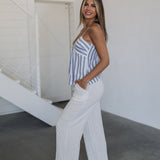 Side view of Nautical Striped Tank Top with V-neck, blue stripes, and spaghetti straps. 