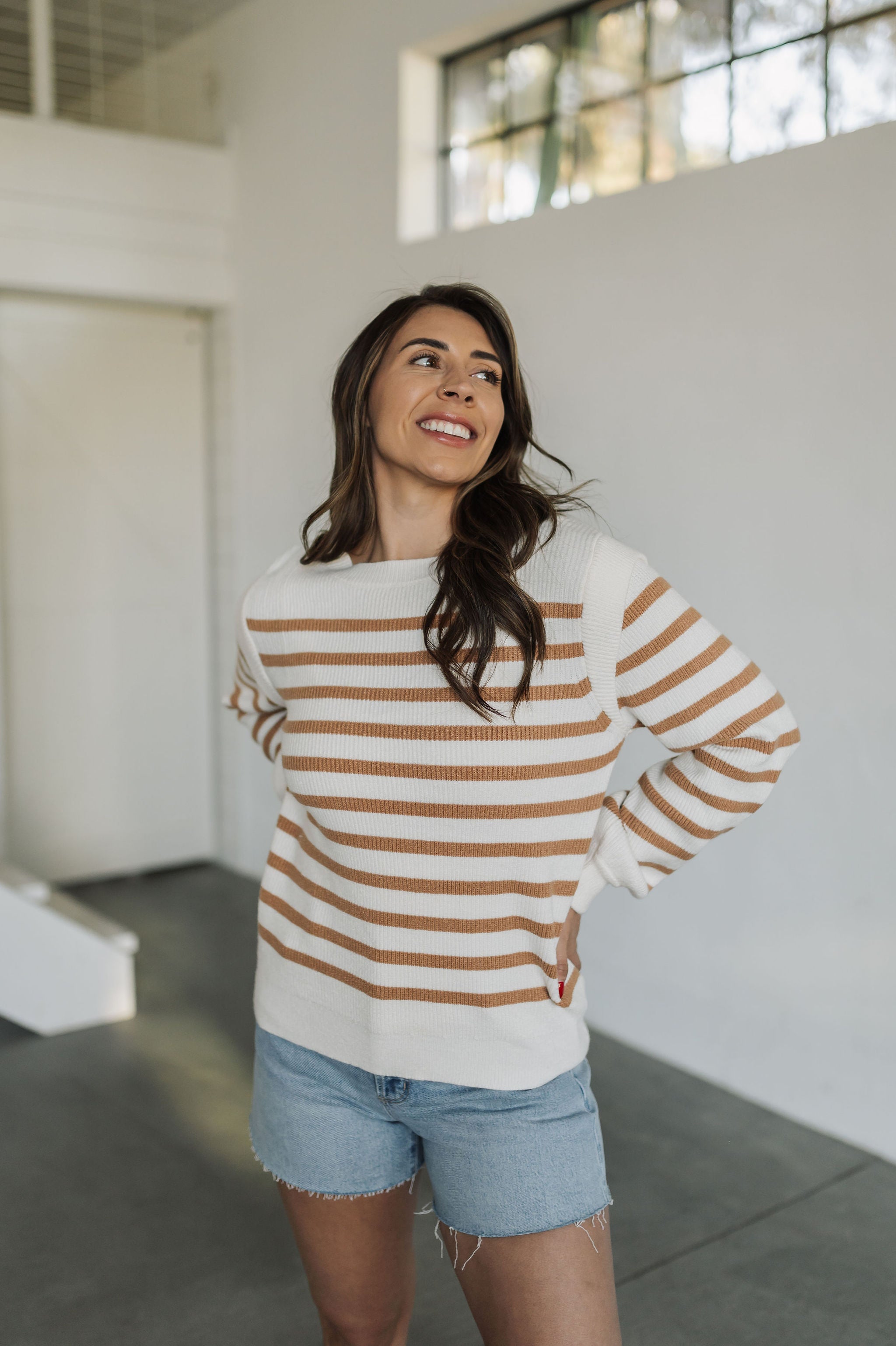 Front view of Eloise Crew Neck Stripe Sweater with shoulder detail. 