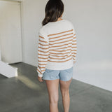 Rear view of Eloise Crew Neck Stripe Sweater with shoulder detail. 