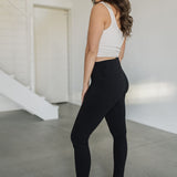 Side view of High Rise Legging with wide waistband.
