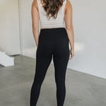 Rear view of High Rise Legging with wide waistband.