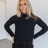 Front view of cropped black  Mock Turtle Neck.