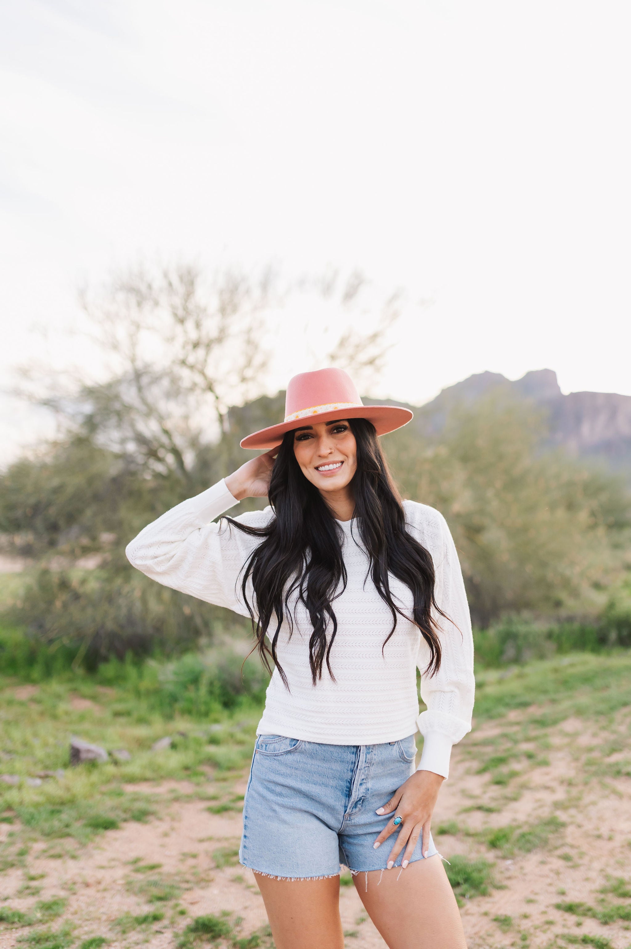 Front view of Astrid sweater with pointelle knit, dolman sleeves, and boat neck. 