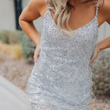 Front view of Sparks Fly Mini Dress with thin straps and allover fringe and sequin details. 