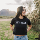 Front view of Hey Y'all Graphic Tee in mineral wash, distressed graphic, and raw hem. 