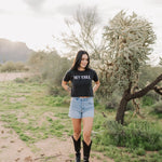 Front view of Hey Y'all Graphic Tee in mineral wash, distressed graphic, and raw hem. 