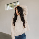 Front view of natural Ryleigh Sweater with rolled mock neck.