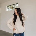 Front view of natural Ryleigh Sweater with rolled mock neck.