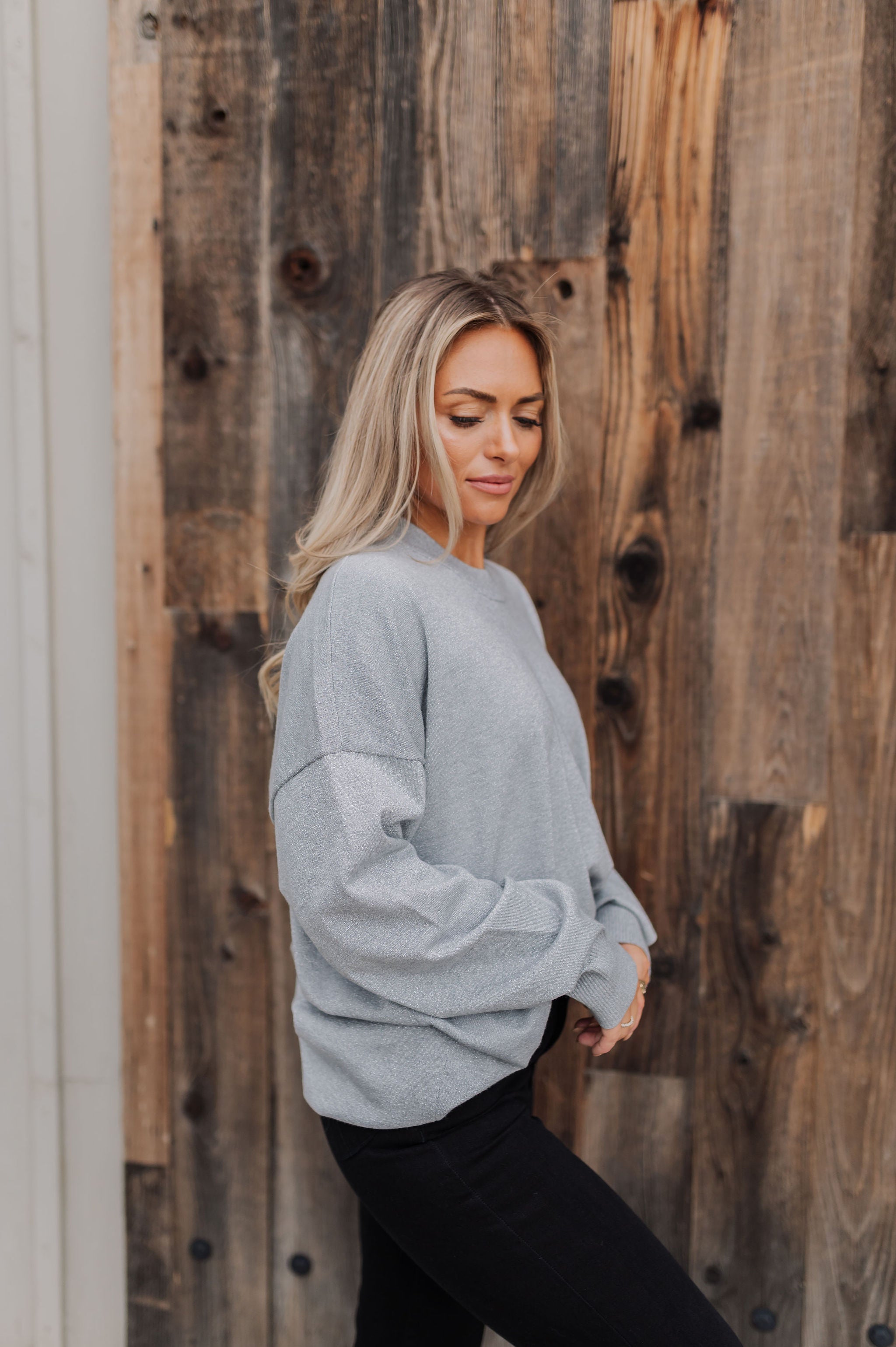 Side view of Classic Crewneck in silver metallic with dropped shoulders.