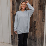 Front view of Classic Crewneck in silver metallic with dropped shoulders and oversized length.