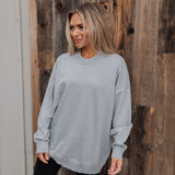 Front view of Classic Crewneck in silver metallic with dropped shoulders and oversized length.