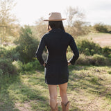 Rear view of Outlaw Long Sleeve Dress in dark denim.