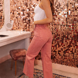 Side view of rose colored Sailor Scoop wide leg ankle jeans.  