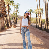 Front view of cropped white High Neck Jersey Tank.