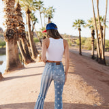 Rear view of cropped white High Neck Jersey Tank.