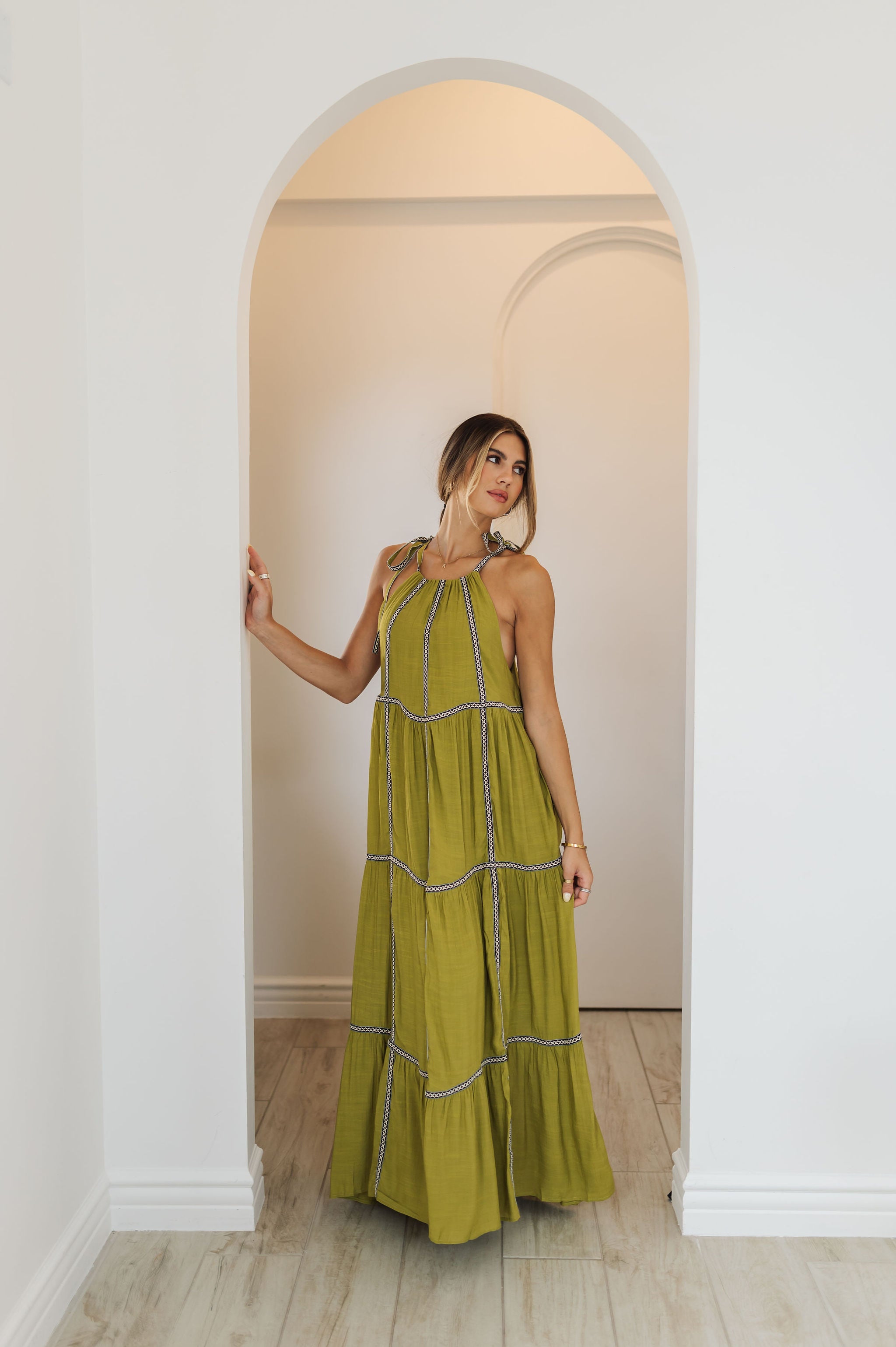 Front view of Palm Skies Tiered Maxi Dress in green with tiered and blocking details and self tie shoulder straps. 