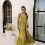 Front view of Palm Skies Tiered Maxi Dress in green with tiered and blocking details and self tie shoulder straps. 